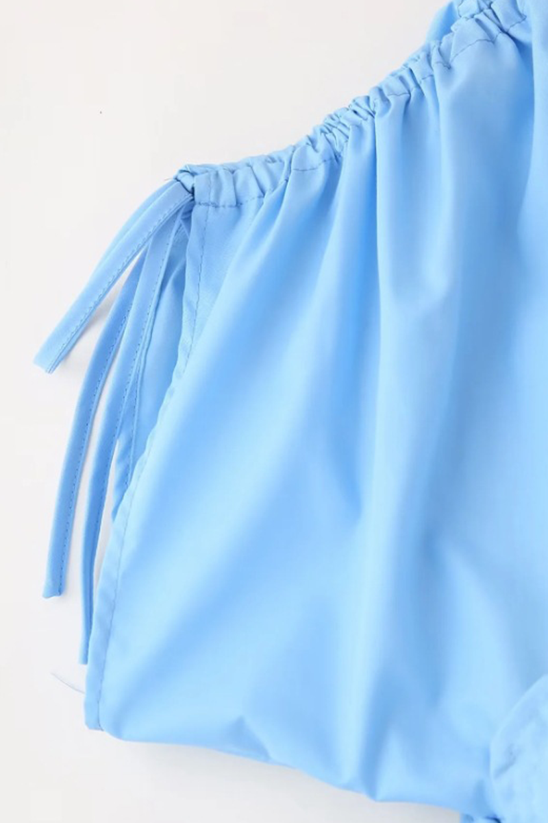 Yasmin® | Elegante effen bloemvorm met trekkoord en V-hals en taillerok