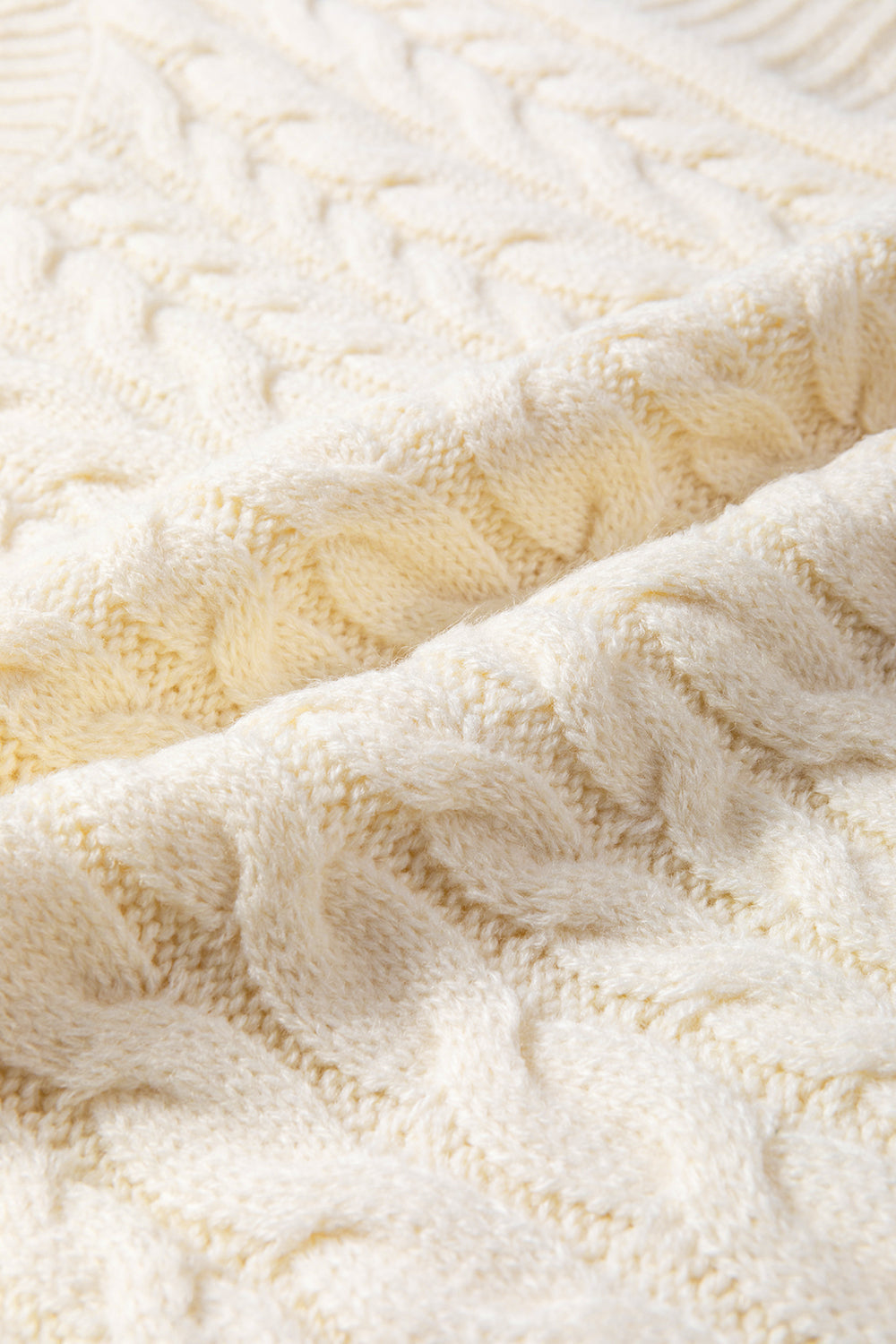 Thea® | Kabelgebreide coltrui