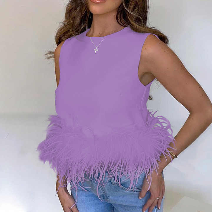 Yesenia® | Elegante mouwloze top met verenaccent