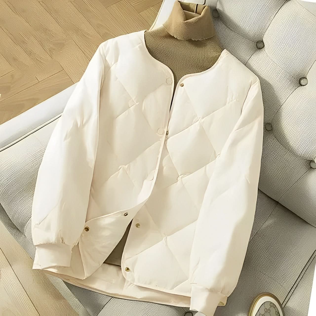 Yara® | Zwart pufferjack met moderne gewatteerde print voor dames