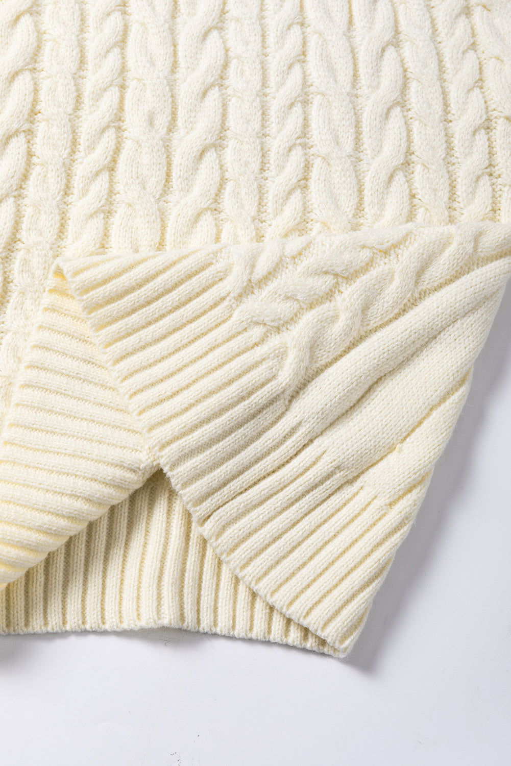 Thea® | Kabelgebreide coltrui