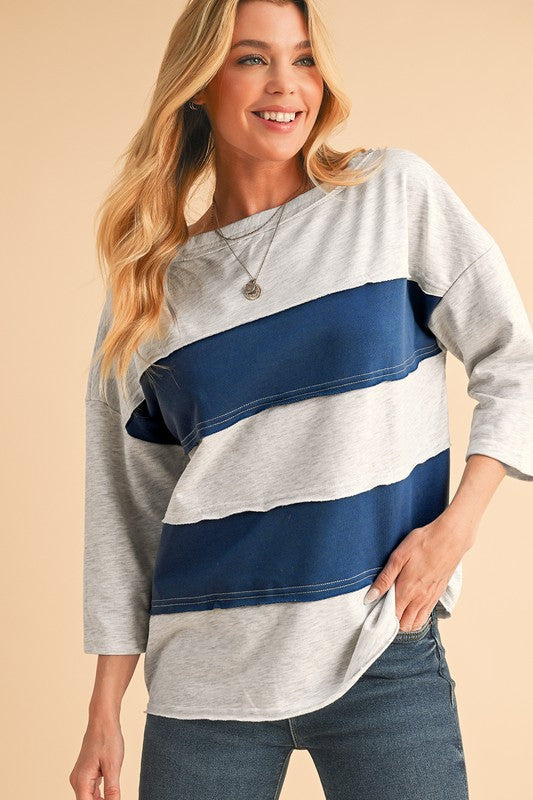Zulema® | Gestreept patchwork sweatshirt met onafgewerkte randen