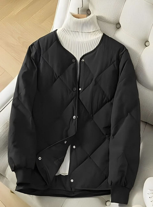 Yara® | Zwart pufferjack met moderne gewatteerde print voor dames