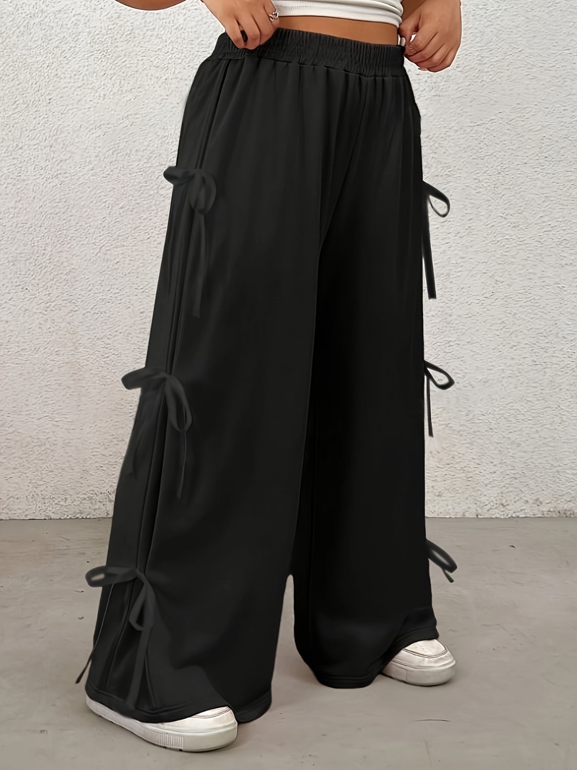 Thea® | Plus size broek met strik, elastische taille en wijde pijpen