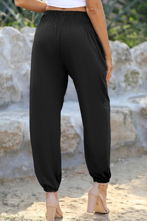 Teresa® | Zwarte gesmokte joggingbroek met hoge taille en zakken
