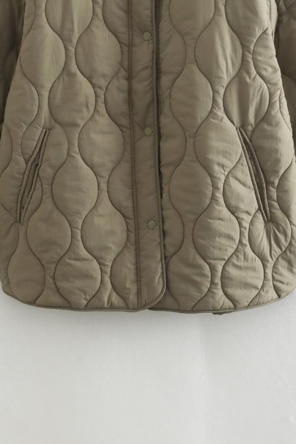 Tracy® | Effen gewatteerd jack met losse ronde hals
