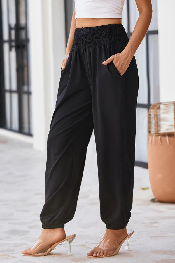 Teresa® | Zwarte gesmokte joggingbroek met hoge taille en zakken